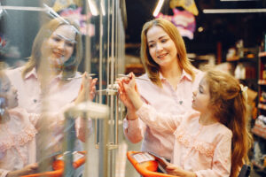 Mom and daughter looking at home schooling curriculum 